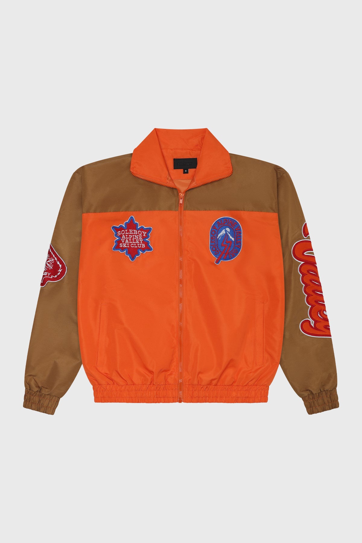 Summit Crest Windbreaker (Orange/Gold)